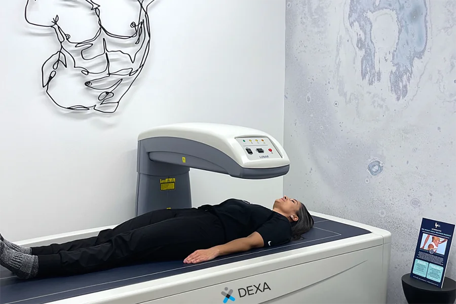 Patient laying on the DEXA machine