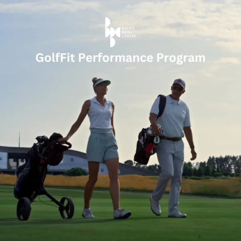 couple walking on golf course